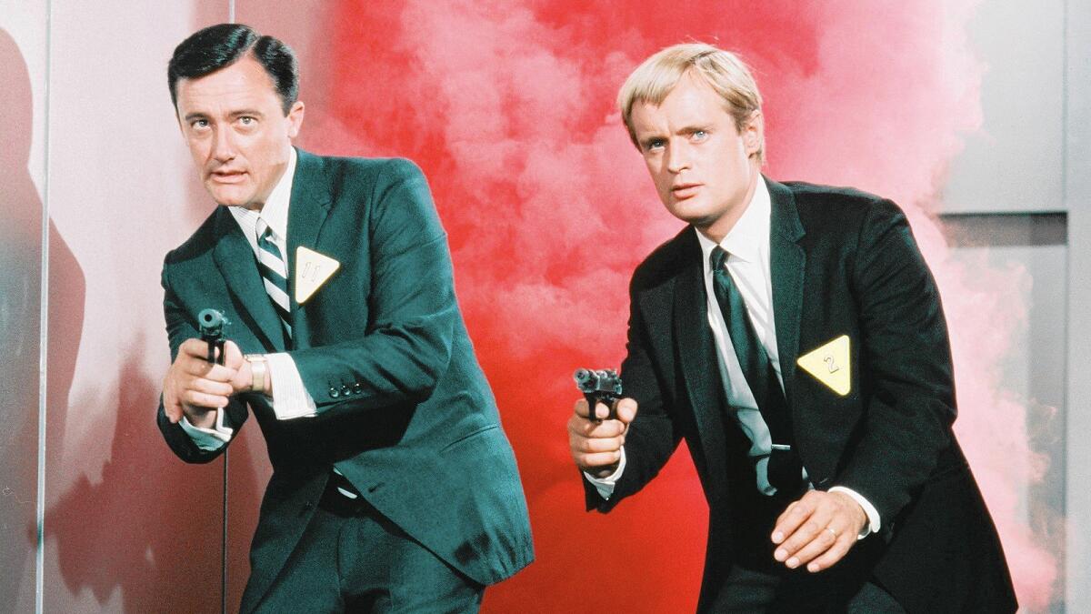 Robert Vaughn, left, as Napoleon Solo and David McCallum as Illya Kuryakin in the mid-1960s TV series "The 'Man from U.N.C.L.E."