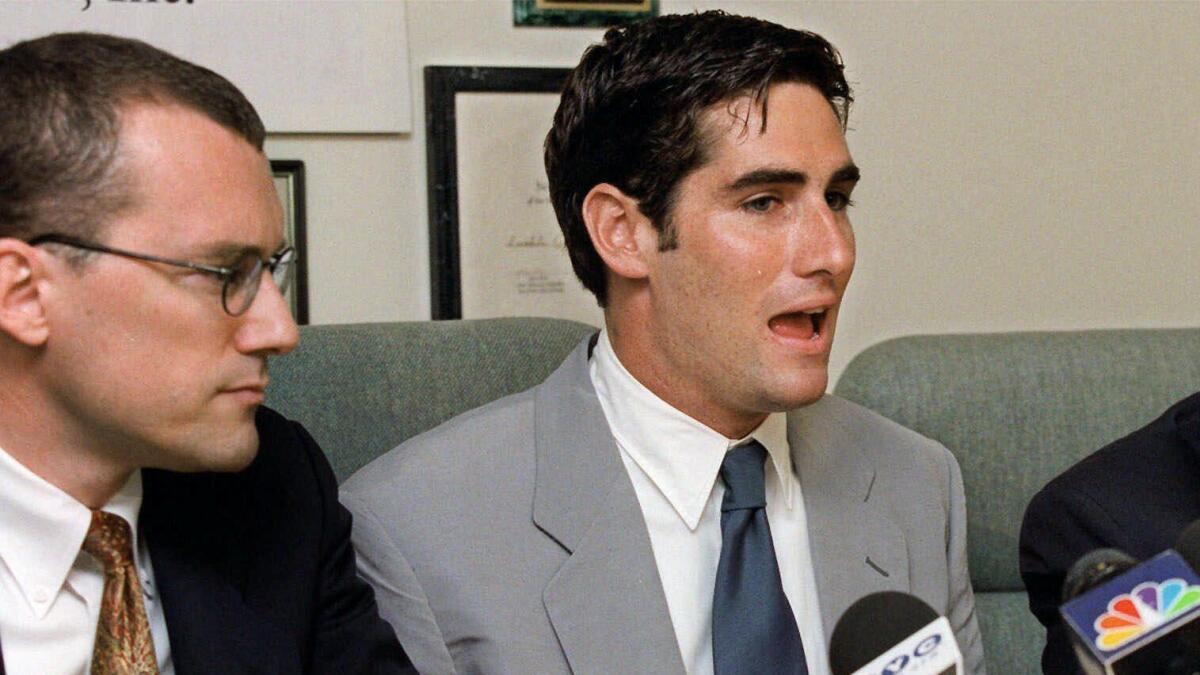 David Buckel, left, in 1999 at a news conference with James Dale, a Matawan, N.J., assistant Scoutmaster who was kicked out of the Boy Scouts when leaders found out he was gay.