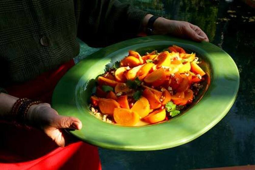 Fuyus are the small, crisp persimmons. They're only slightly sweet, so when paired with an assertive vinaigrette, they make a refreshing salad. Recipe: Fuyu persimmon salad