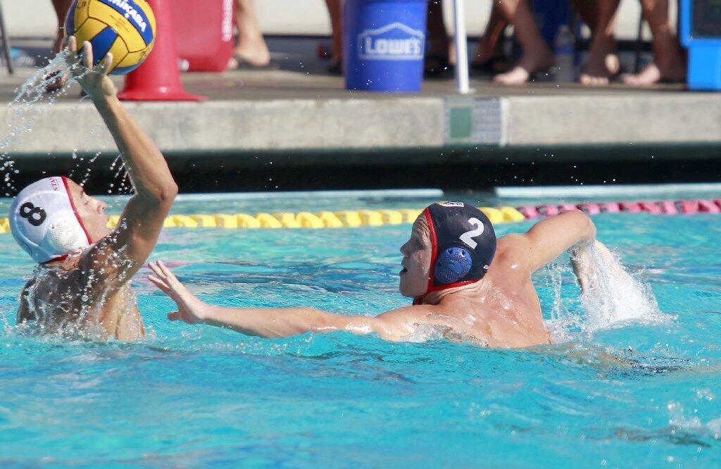 Regency Water Polo's Spencer Carroll (2) defends against Stanford during the first half in the USA Junior Olympics 18U boys' bronze match at the William Woollett Aquatic Center in Irvine on Tuesday.