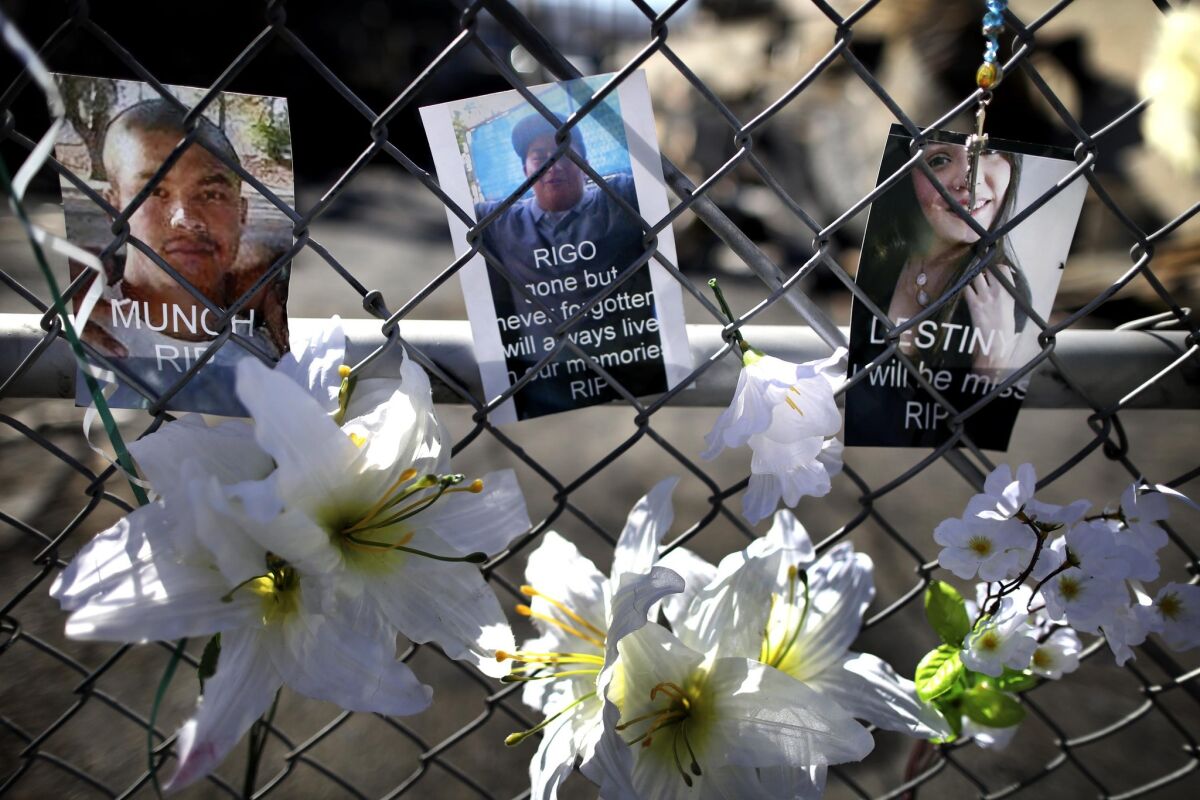 A memorial was set up for three young victims — two male and one female — who were found dead in a tire shop after an April firebombing in South El Monte.