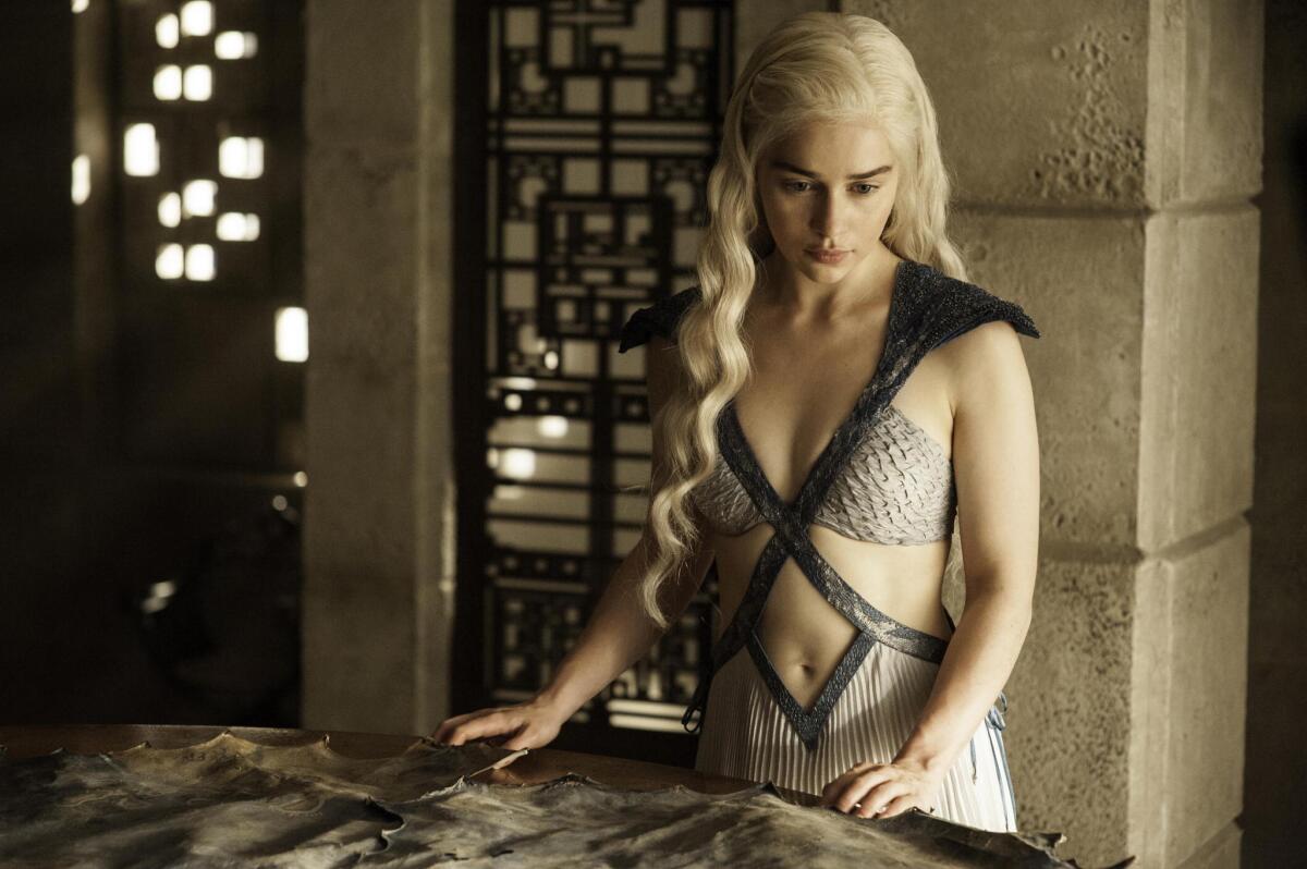 Daenerys Targaryen (Emilia Clarke) appears in a scene from Season 4 of "Game of Thrones." The fifth-season premiere airs on Sunday, but thousands have already seen it via episodes leaked online Saturday night.