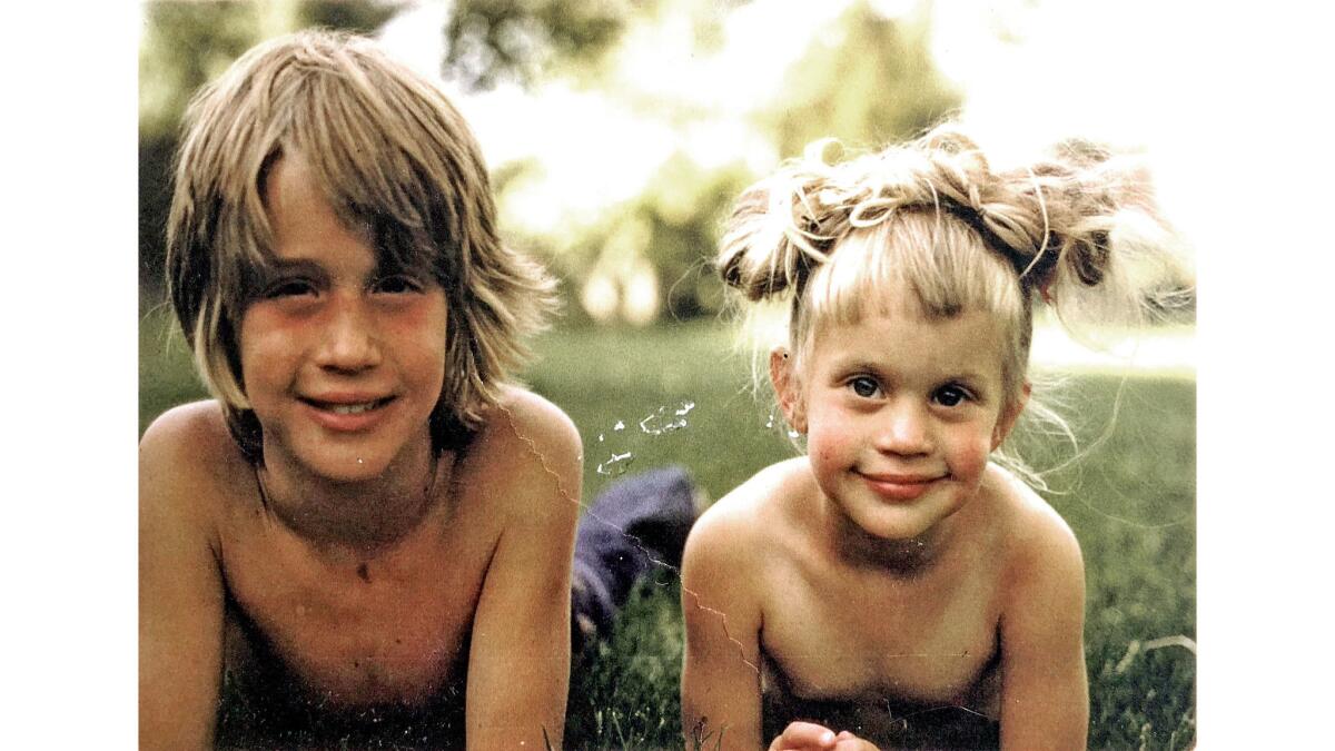 Siblings Scott and Adrienne "Sunny" Sudweeks in a childhood photo.