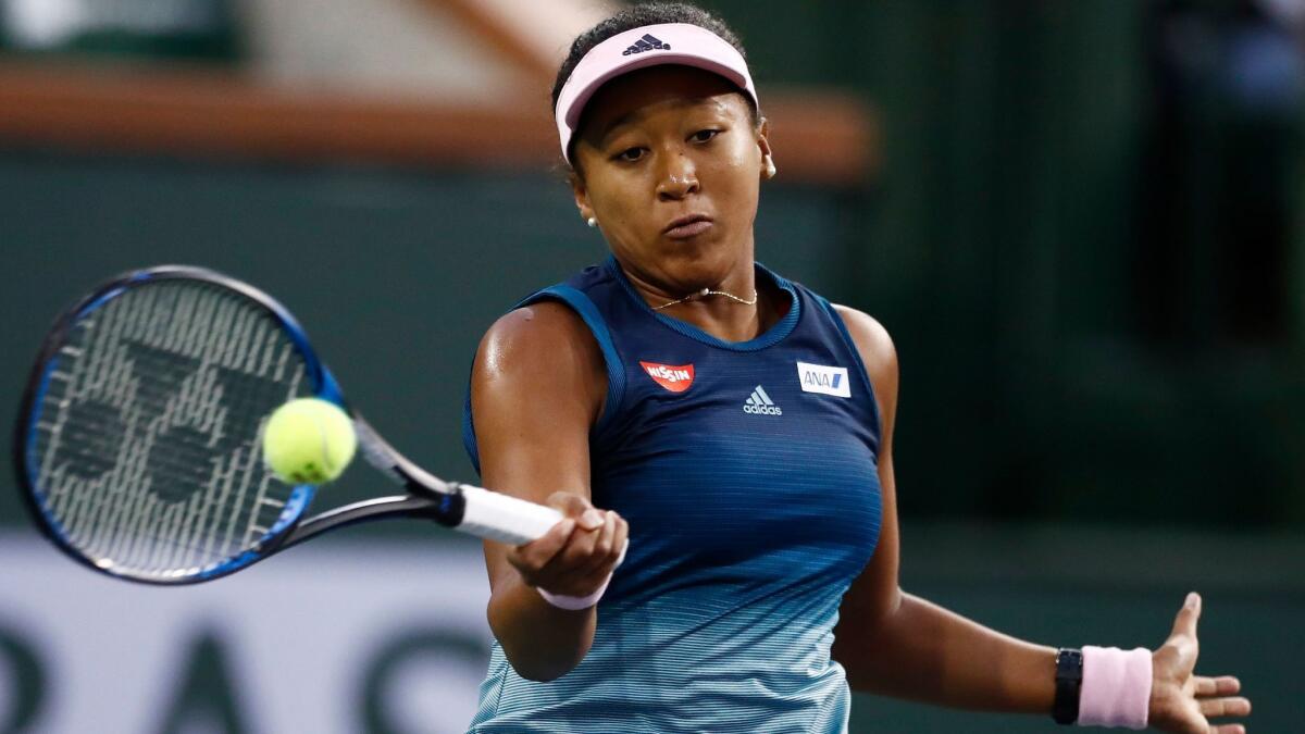 Naomi Osaka in action against Danielle Collins during the BNP Paribas Open at the Indian Wells Tennis Garden.