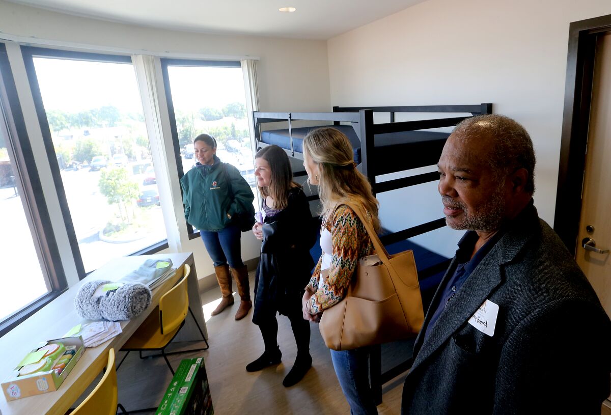 Larry Buford tours the Angeles House residential project for homeless families in South Los Angeles