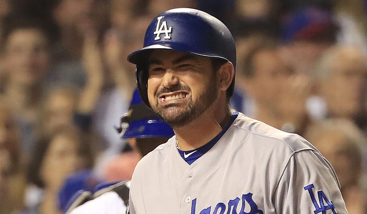 Dodgers' Adrian Gonzalez reacts after striking out against the Chicago Cubs on Sunday.
