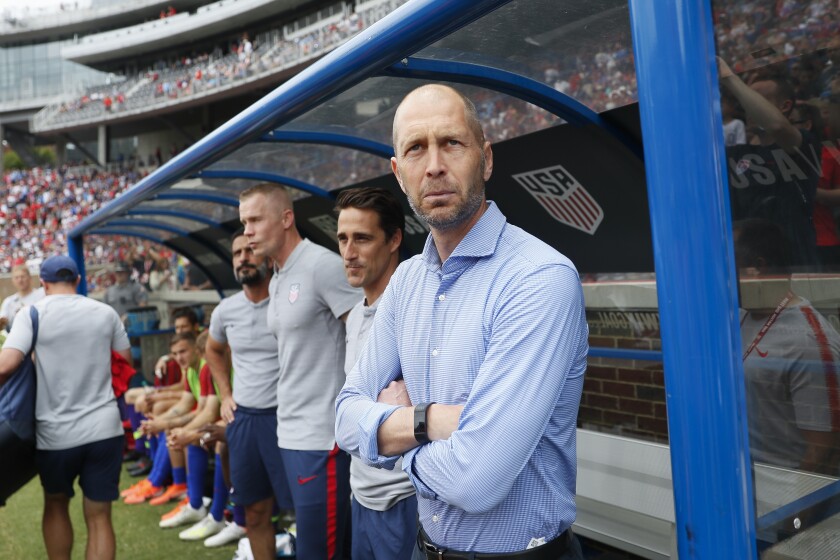 FILE - In this June 9, 2019, file photo, United States head coach Gregg Berhalter stands on the sideline before the first half of an international friendly soccer match against Venezuela in Cincinnati. A day after last week's deadly riot in the Capitol by a pro-Trump mob, players from the U.S. soccer team gathered in Bradenton, Fla., and considered what they could do to set a positive example for a shaken country. Berhalter said he has not yet spoken to players about the events in Washington. (AP Photo/John Minchillo, File)