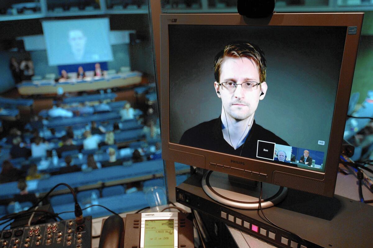 Former National Security Agency contractor Edward Snowden is seen in June via a live video link from Russia during a hearing at the Council of Europe in Strasbourg, France.