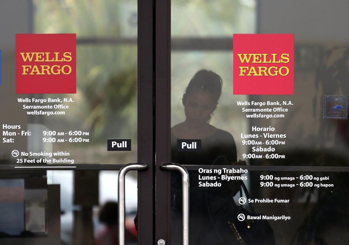 Wells Fargo faces a legal action filed by New York Atty. Gen. Eric Schneiderman, who claims the bank failed to live up to the terms of the landmark $25-billion national mortgage settlement.
