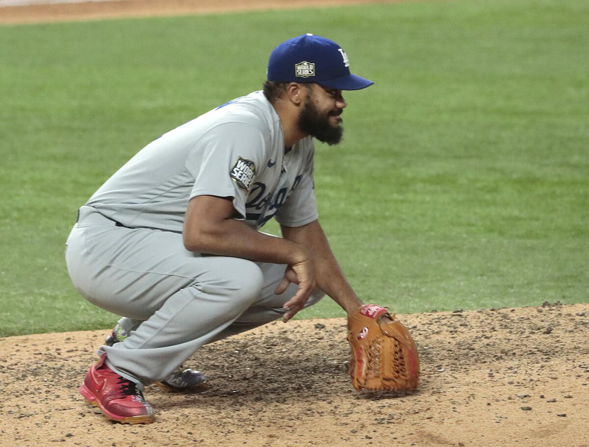 Dodgers relief pitcher Kenley Jansen reacts after giving up a home run to Tampa Bay's Brett Phillips.