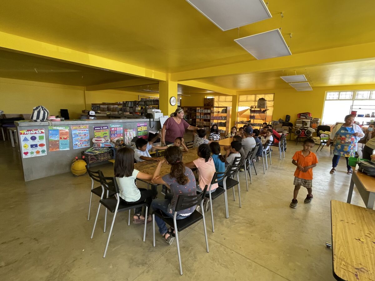 Children in Rosarito took an English lesson as part of the regular schedule of classes offered at a small library.