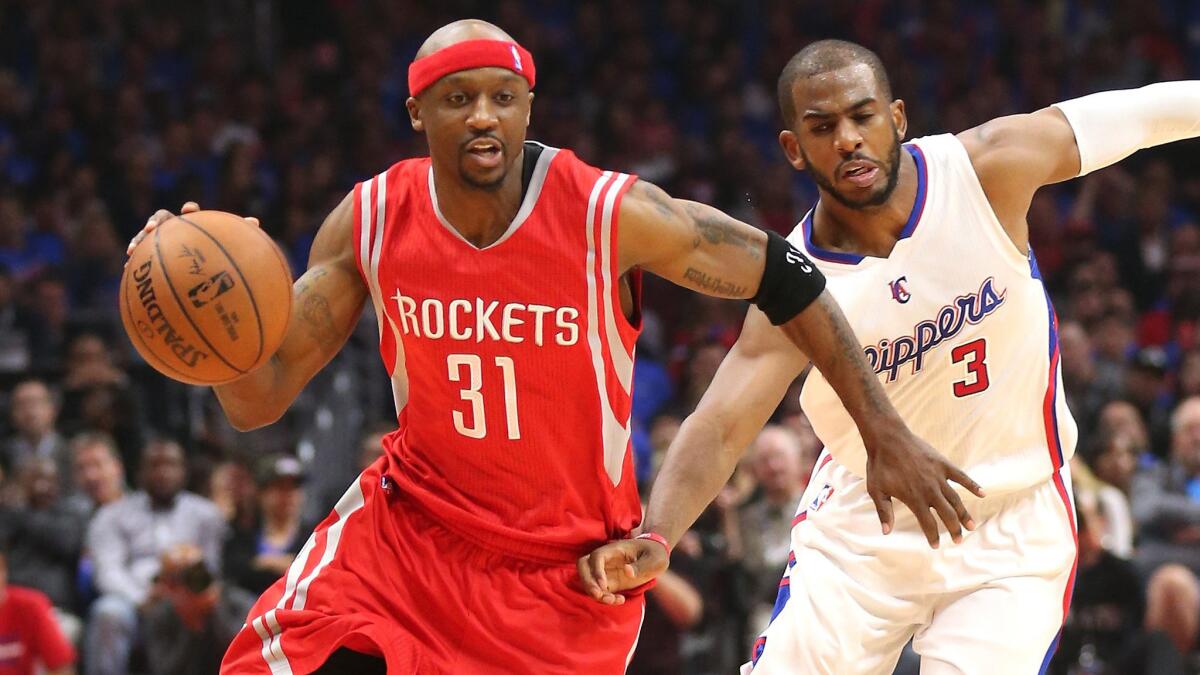 Houston Rockets guard Jason Terry, left, drives to the basket ahead of Clippers point guard Chris Paul during Game 6 of the Western Conference semifinals at Staples Center on May 14, 2015.