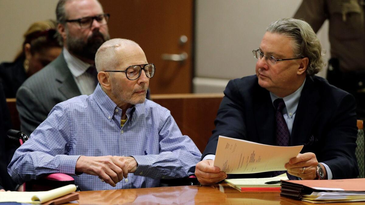 Criminal defense attorney David Chesnoff, right, confers with his client, New York real estate scion Robert Durst. As Durst's murder case moves toward trial, tension has escalated between members of his defense team and the prosecution.