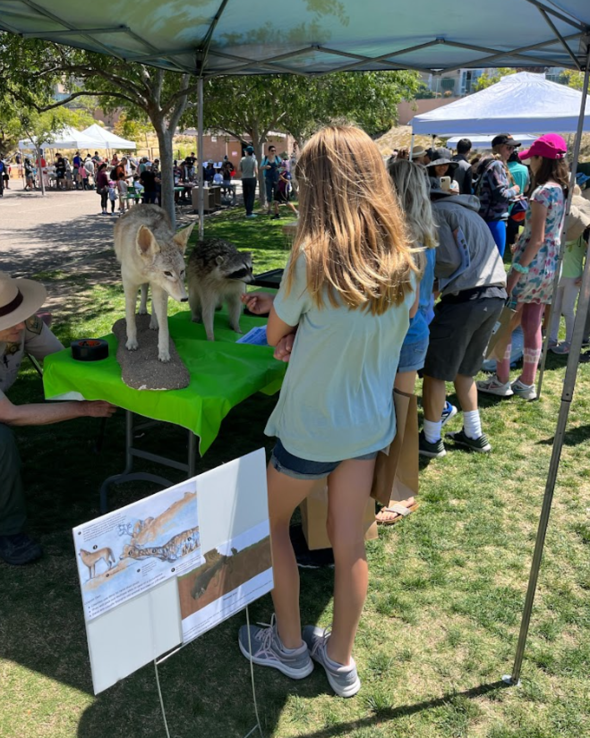 Students check out the San Diego County Parks and Recreation exhibit