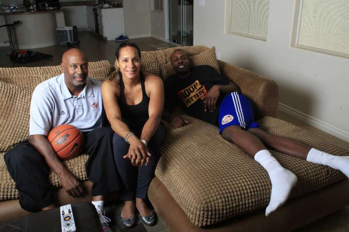 Shabazz Muhammad with his parents Ron and Faye in 2011.
