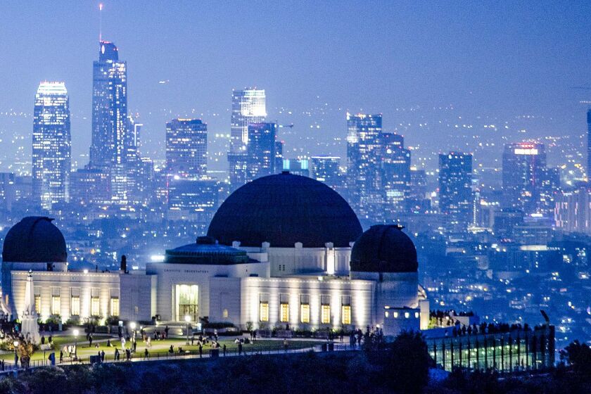  Dusk settles in over the city in a view from above the Griffith Park Observatory toward downtown Los Angeles 