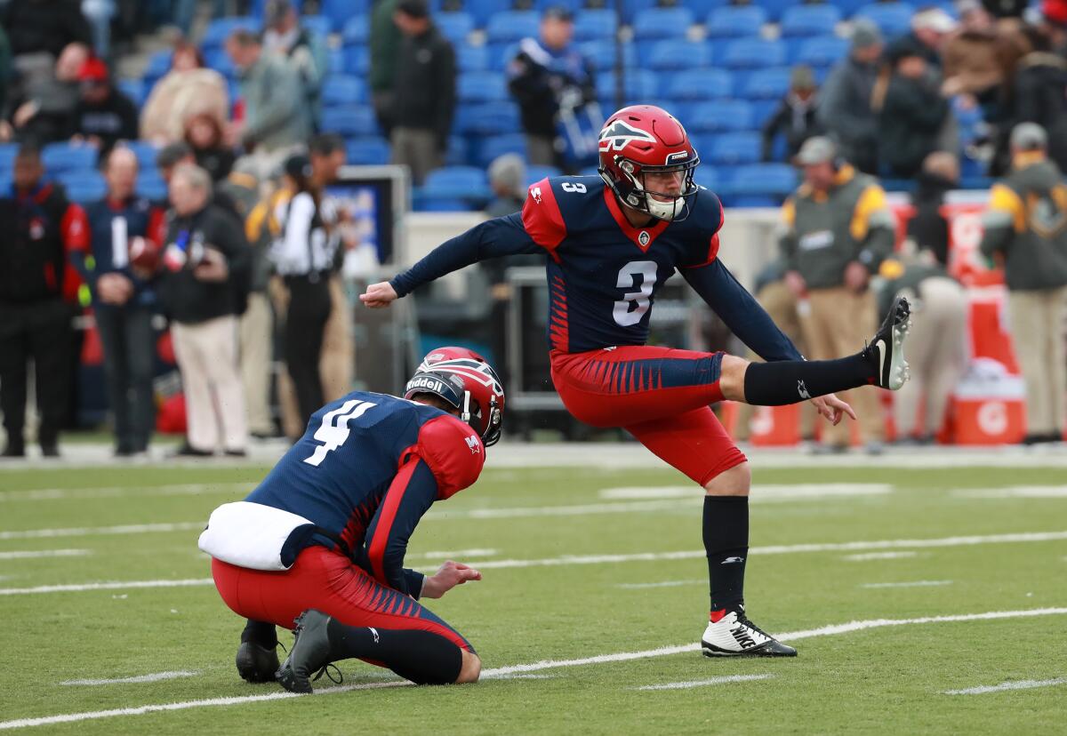 Austin MacGinnis of the Memphis Express attempts a field goal as Ryan Winslow holds the ball against the San Diego Fleet during an Alliance of American Football game on March 2, 2019 in Memphis.