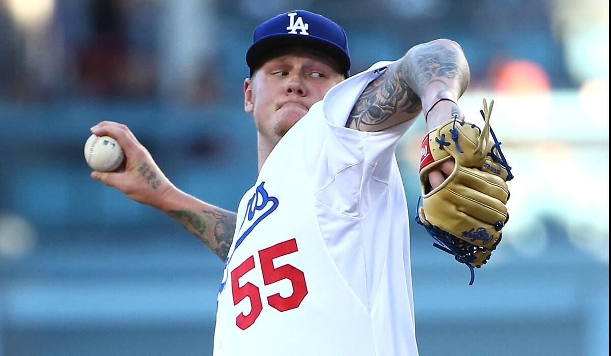Dodgers pitcher pitcher Mat Latos pitches against the Chicago Cubs during the second inning on Saturday.