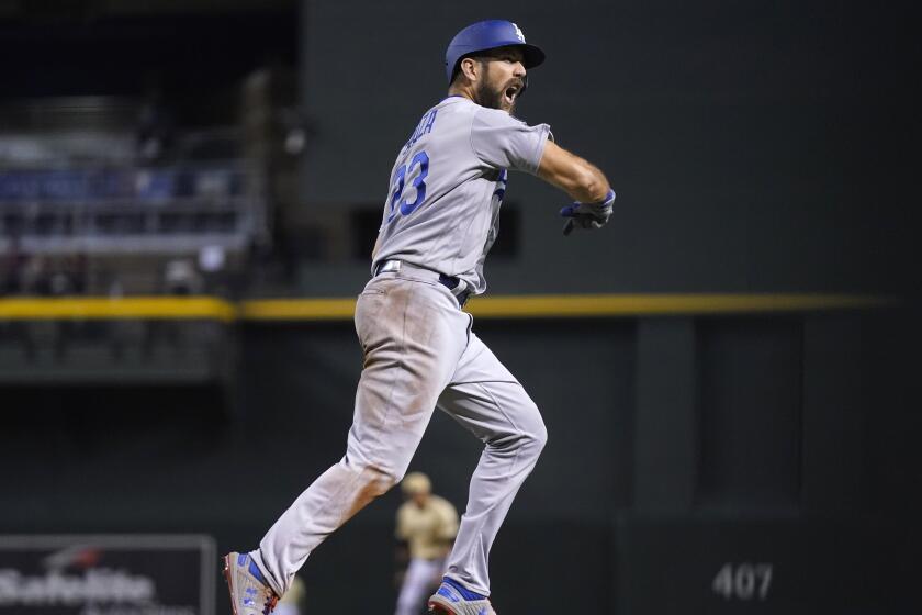 The Dodgers' Steven Souza celebrates his eighth-inning home run against the Arizona Diamondbacks on June 18, 2021.