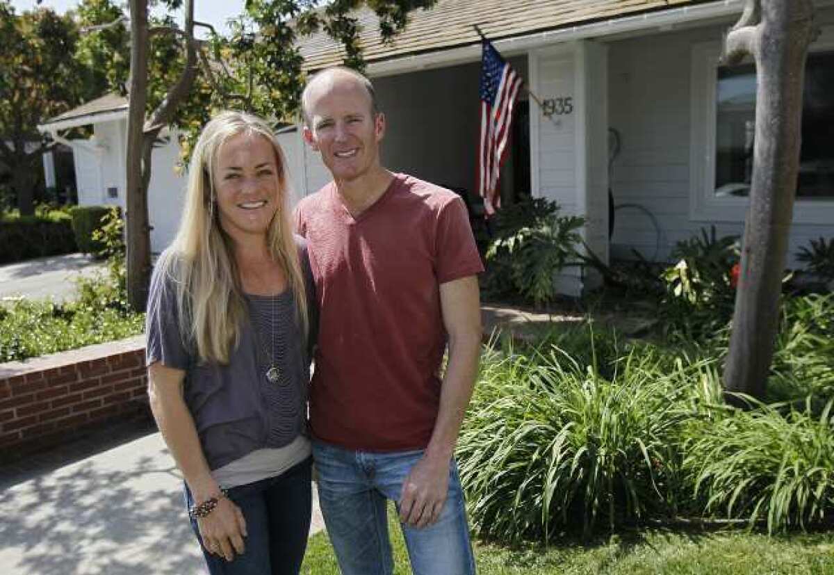 Mollie and Jim Rosing, who both attended Corona del Mar High and live in Newport Beach, will run in the Boston Marathon on Monday.