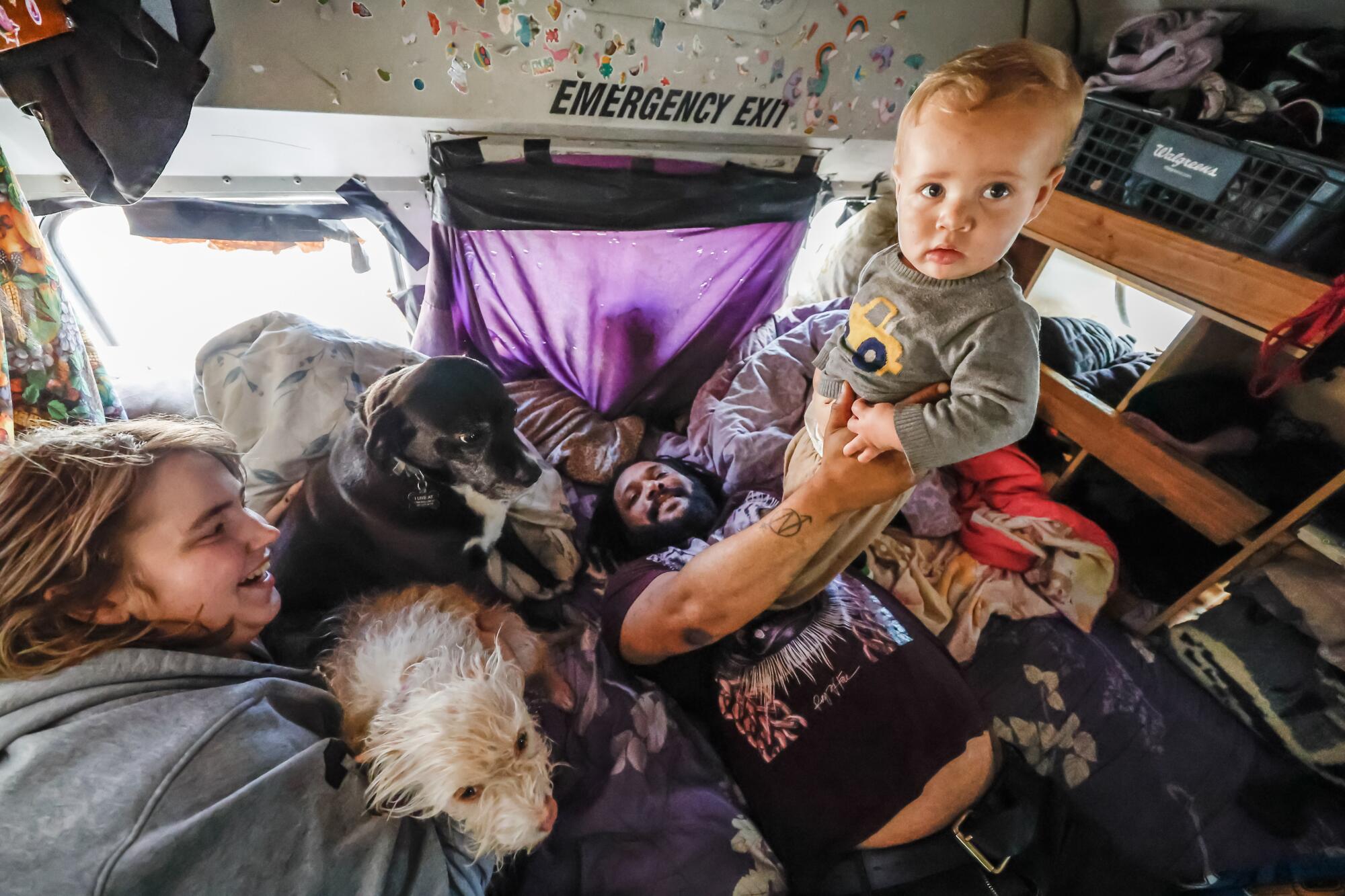 A family living in a school bus