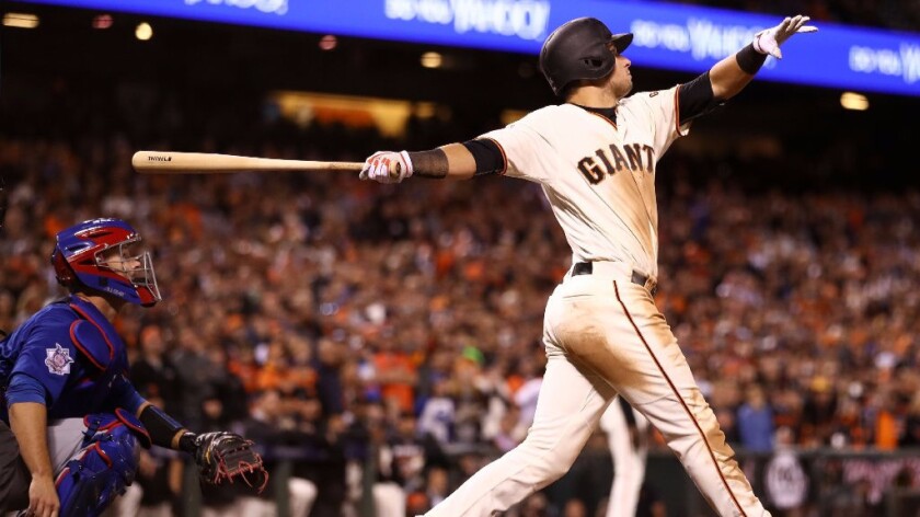Giants infielder Joe Panik doubles home the game-winning run in the 13th inning of NLDS Game 3 against the Chicago Cubs.