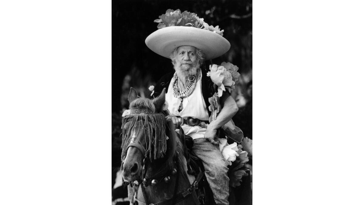 March 25, 1989: Girayr Zorthain waits patiently on his horse Lolita for the parade to start around the Olvera Street plaza for the Blessing of the Animals.