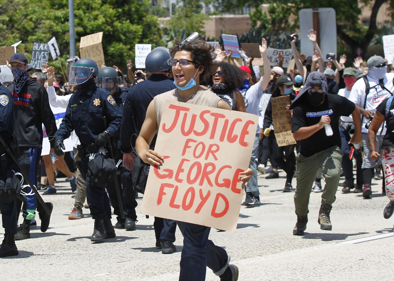 A group protesting the death of George Floyd march on I-5 in downtown San Diego on May 31, 2020.