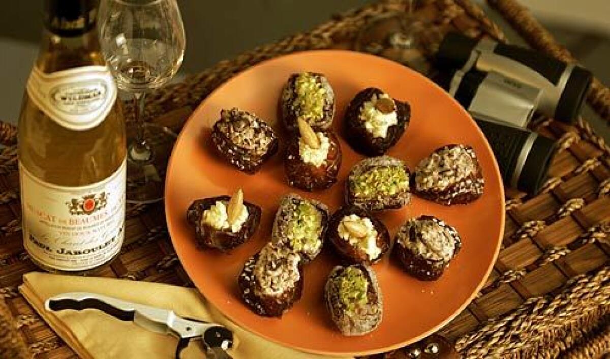 Medjool dates are stuffed with three fillings: blue cheese-almond, goat cheese-Grand Marnier-chocolate and marzipan-pistachio.