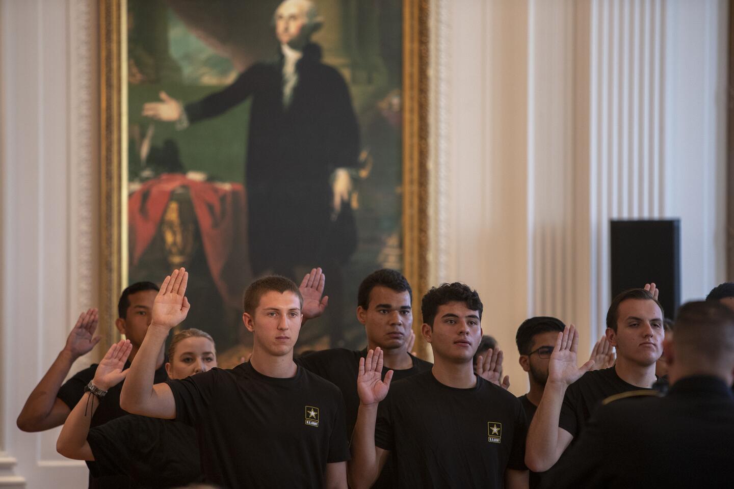 New recruits take the Army Oath of Service during the 9/11 Commemoratrion at the Richard Nixion Presidential Library and Museum on Wednesday, September 11.