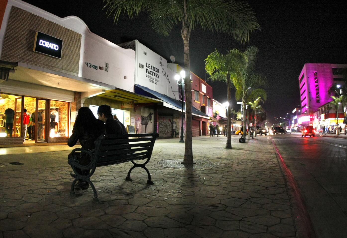 It's a mellow Friday night in Tijuana along a strip on La Revu (Avenida Revolucion), the sense of calm a far cry from years past when fears of drug-war violence kept locals indoors and tourists away.