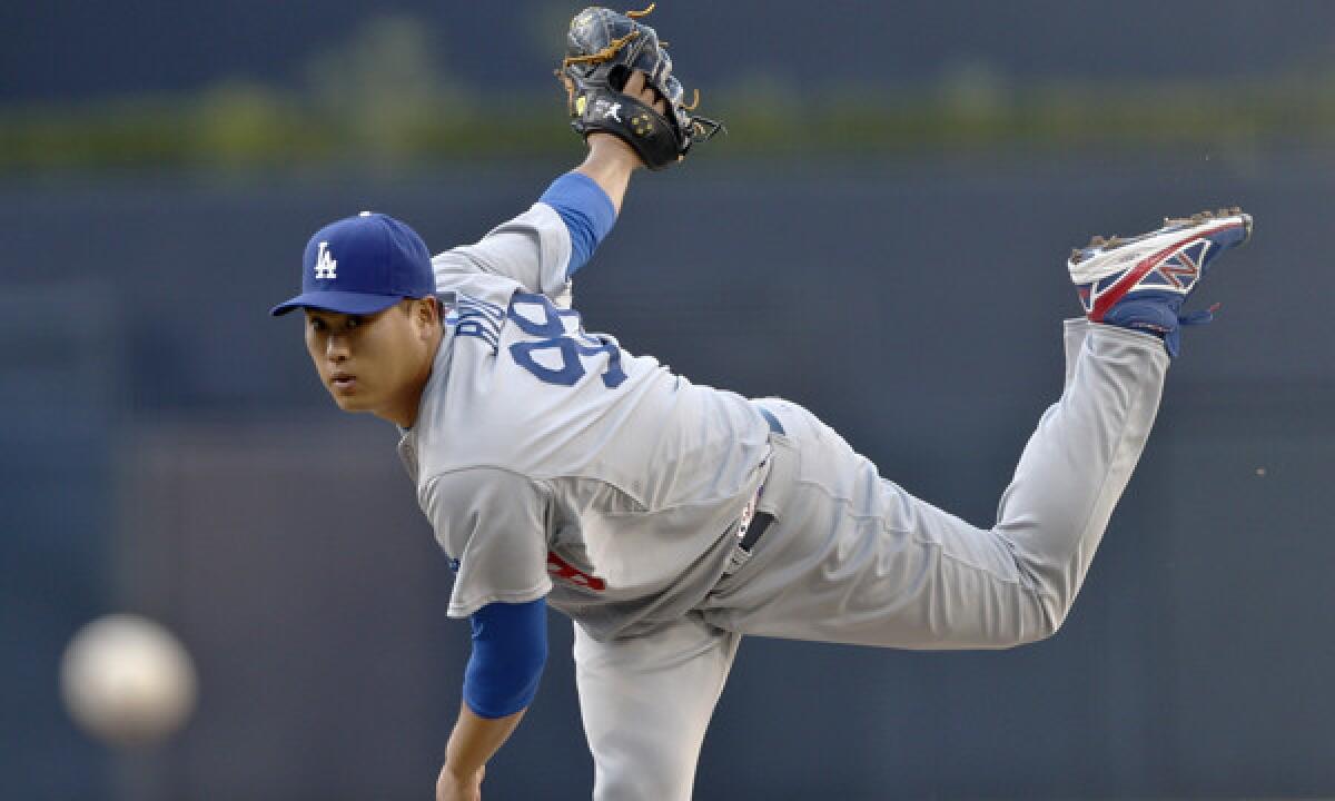 Dodgers starter Hyun-Jin Ryu delivers a pitch during the first inning of the Dodgers' 3-1 loss to the San Diego Padres on Sunday.