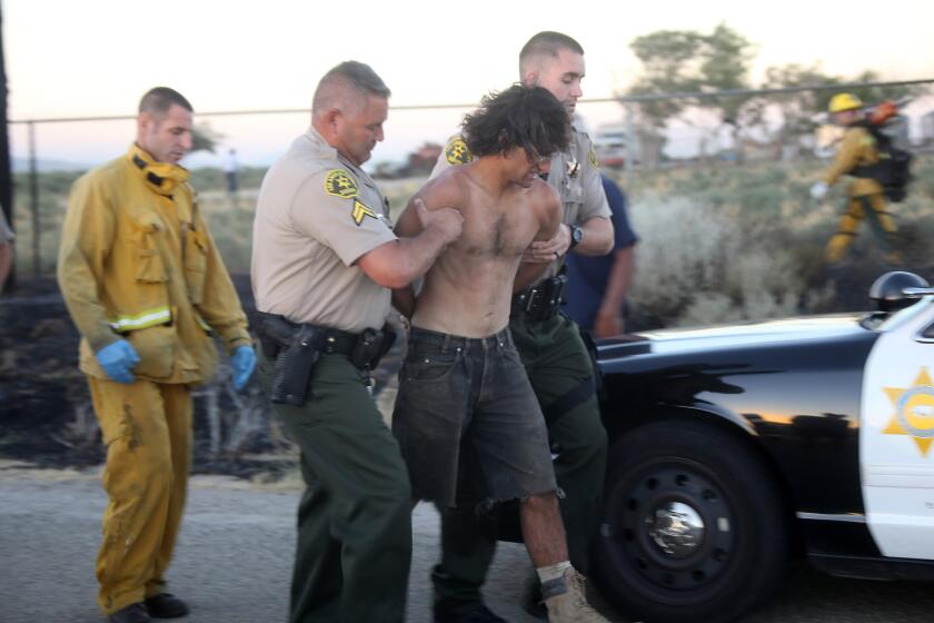 Los Angeles County sheriff's deputies arrest a man suspected of starting a brush fire in Neenach, a small community 34 miles northwest of Lancaster. The department identified the man as 27-year-old David Artiaga.