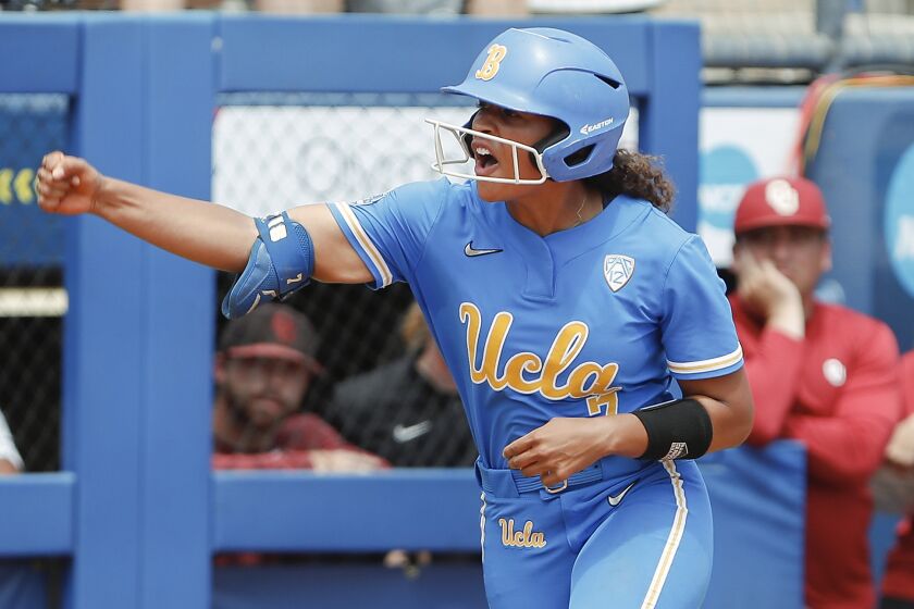 UCLA's Maya Brady (7) celebrates after a home run during the third inning.