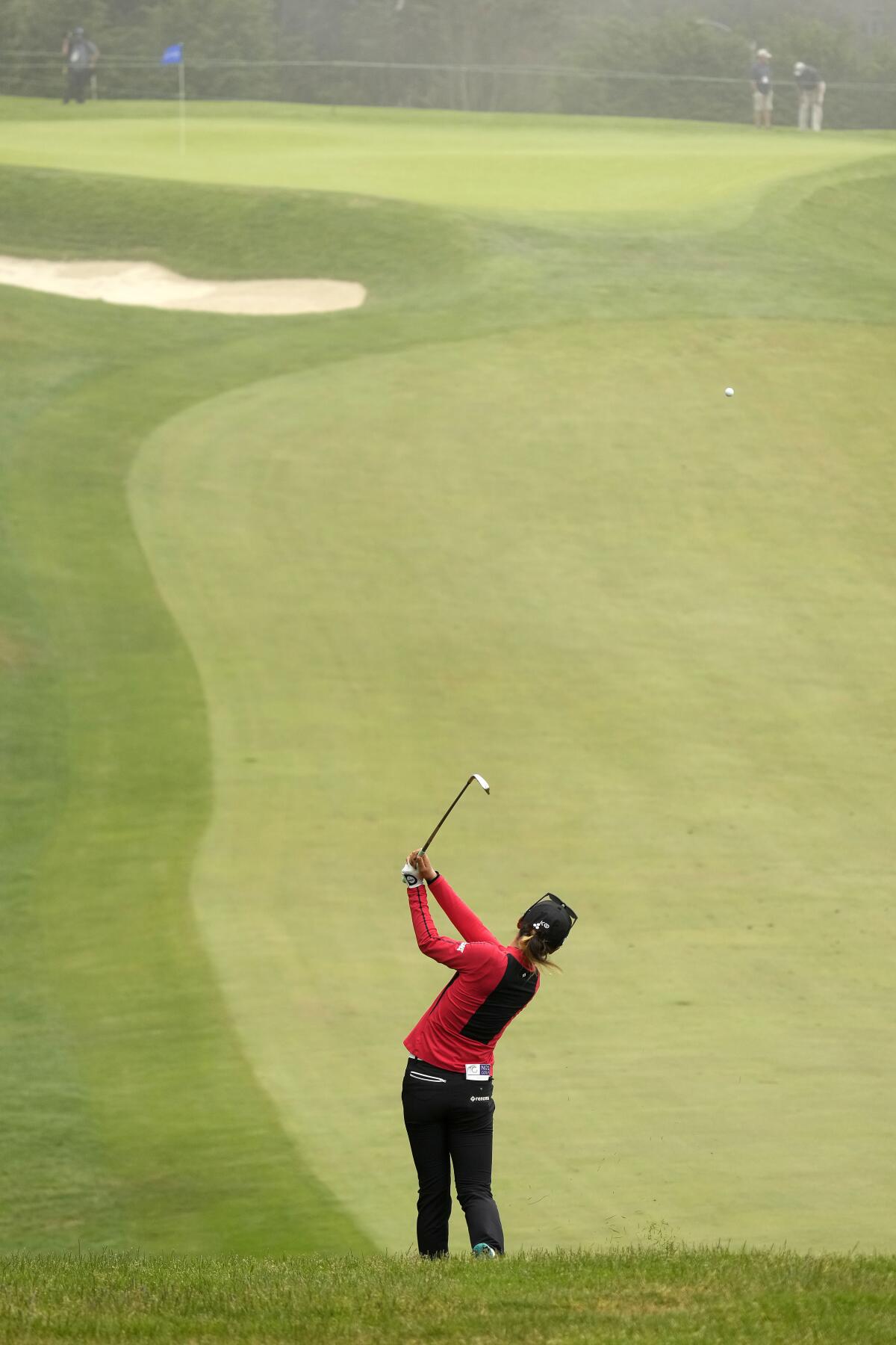 Lydia Ko, of New Zealand, hits from the fairway on the eighth hole at Lake Merced Golf Club during the final round of the LPGA Mediheal Championship golf tournament Sunday, June 13, 2021, in Daly City, Calif. (AP Photo/Tony Avelar)