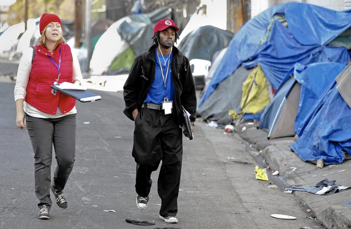 Elizabeth Hill-Nishimura and Tulus Hairston are outreach workers trying to help L.A.'s homeless.