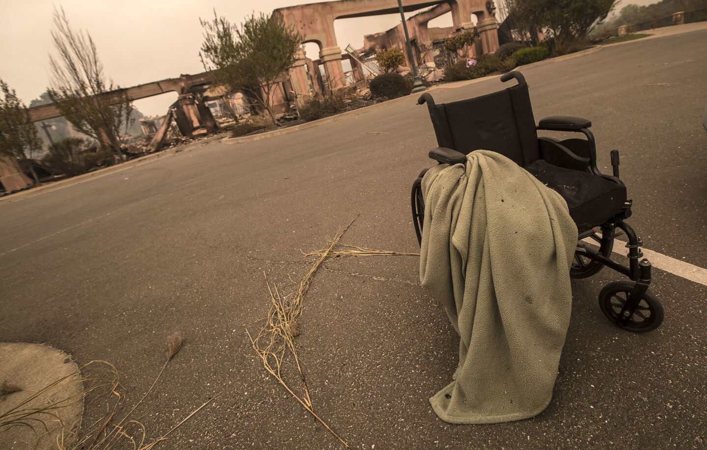 A wheelchair left abandoned at the evacuated Villa Capri assisted living facility on Fountaingrove Parkway in Santa Rosa.