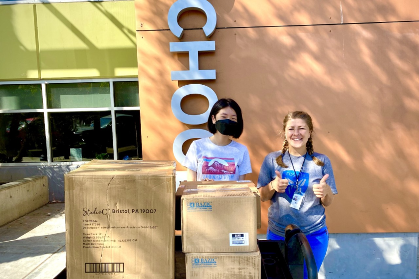 Kate Lee donates art supplies to Monarch School Donations Manager Sarah Krueger