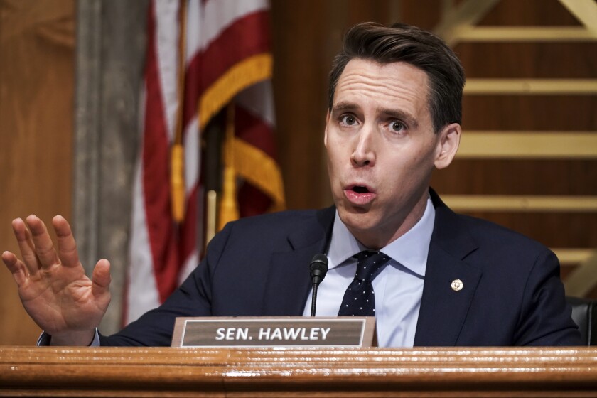 Sen. Josh Hawley, R-Mo., asks questions during a Senate Homeland Security & Governmental Affairs Committee hearing to discuss election security and the 2020 election process on Wednesday, Dec. 16, 2020, on Capitol Hill in Washington. (Greg Nash/Pool via AP)