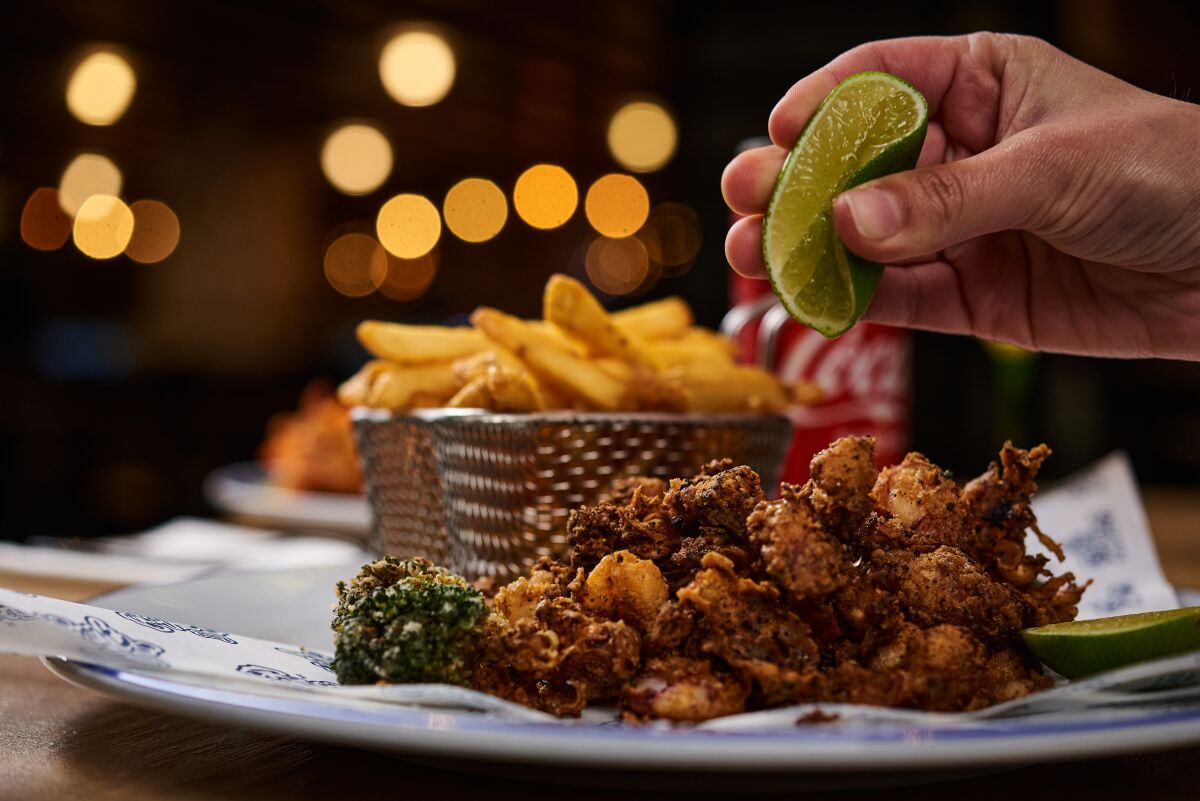 Fried calamari will be a specialty dish at Fisher's San Diego, which is set to open in August in Little Italy.