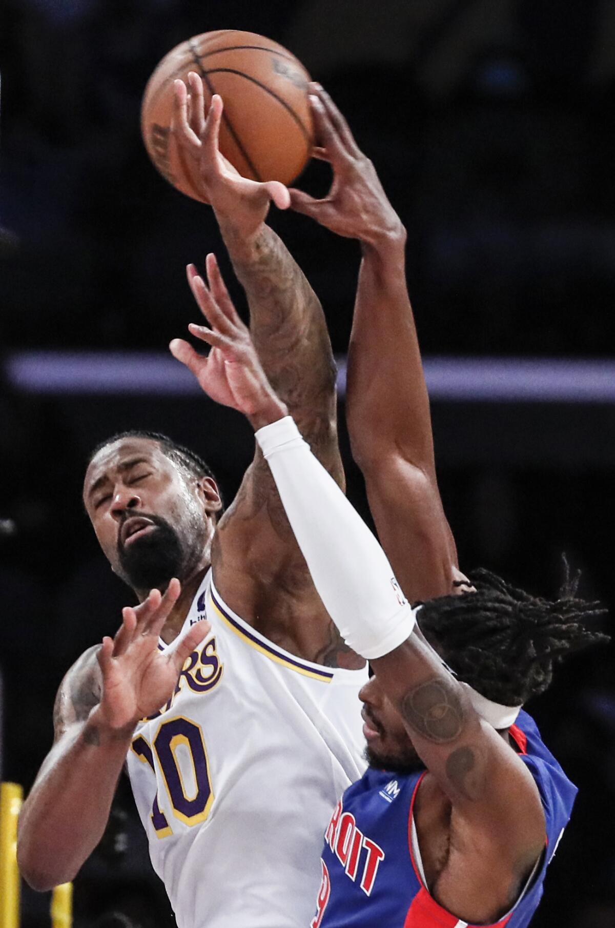 Lakers center DeAndre Jordan blocks Pistons forward Jerami Grant's shot 
