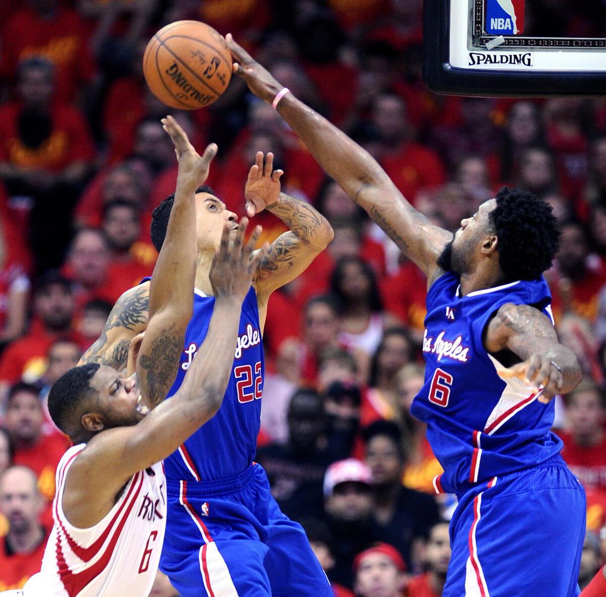 Rockets forward Terrence Jones (6) has his shot blocked by Clippers center DeAndre Jordan in Game 7.