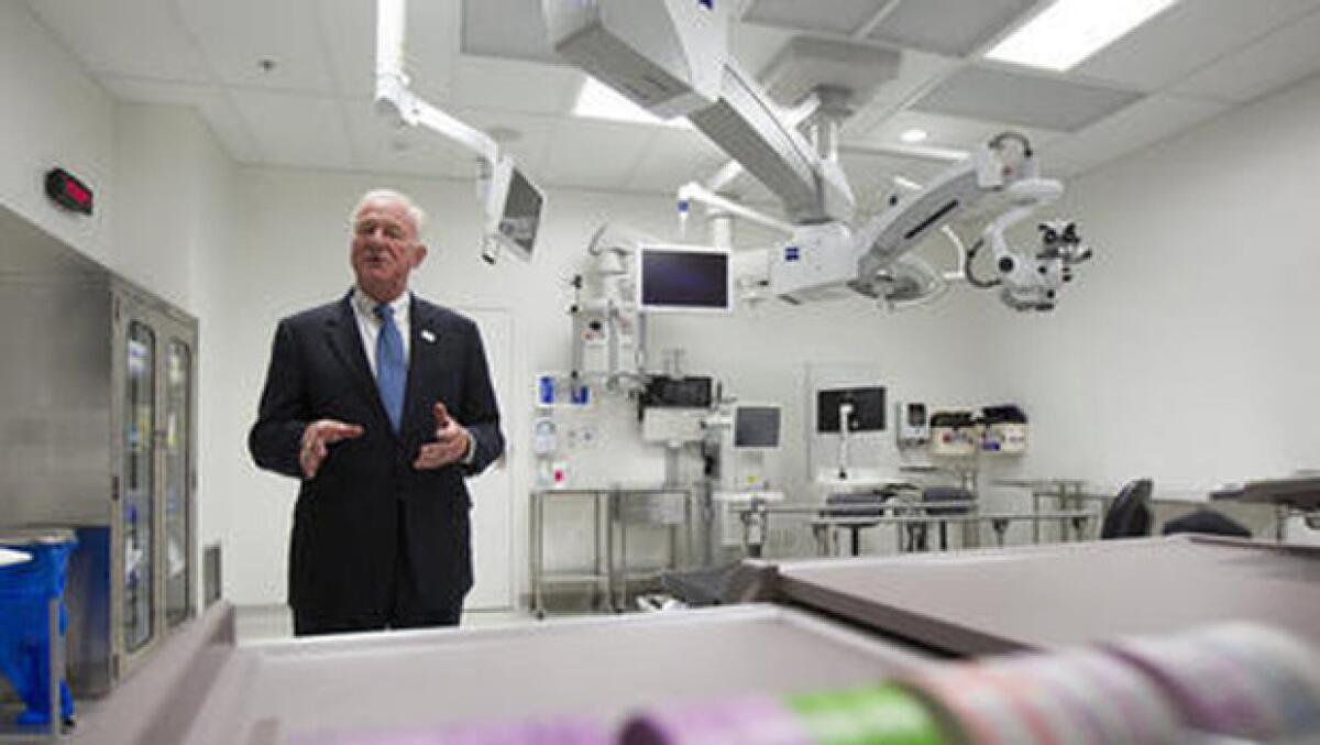 Dr. Roger Steinert, the director of the Gavin Herbert Eye Institute at UC Irvine, gives a tour of an operating room.