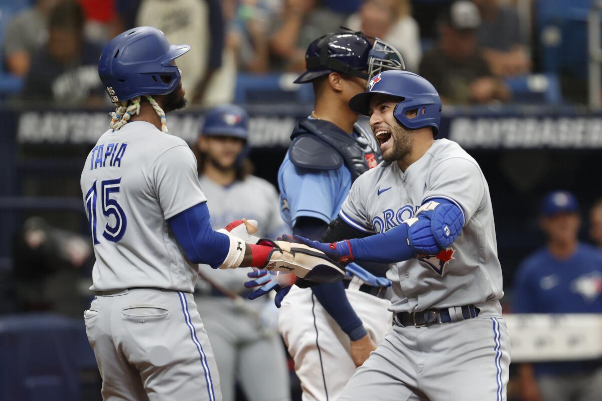 George Springer of the Toronto Blue Jays celebrates a home run