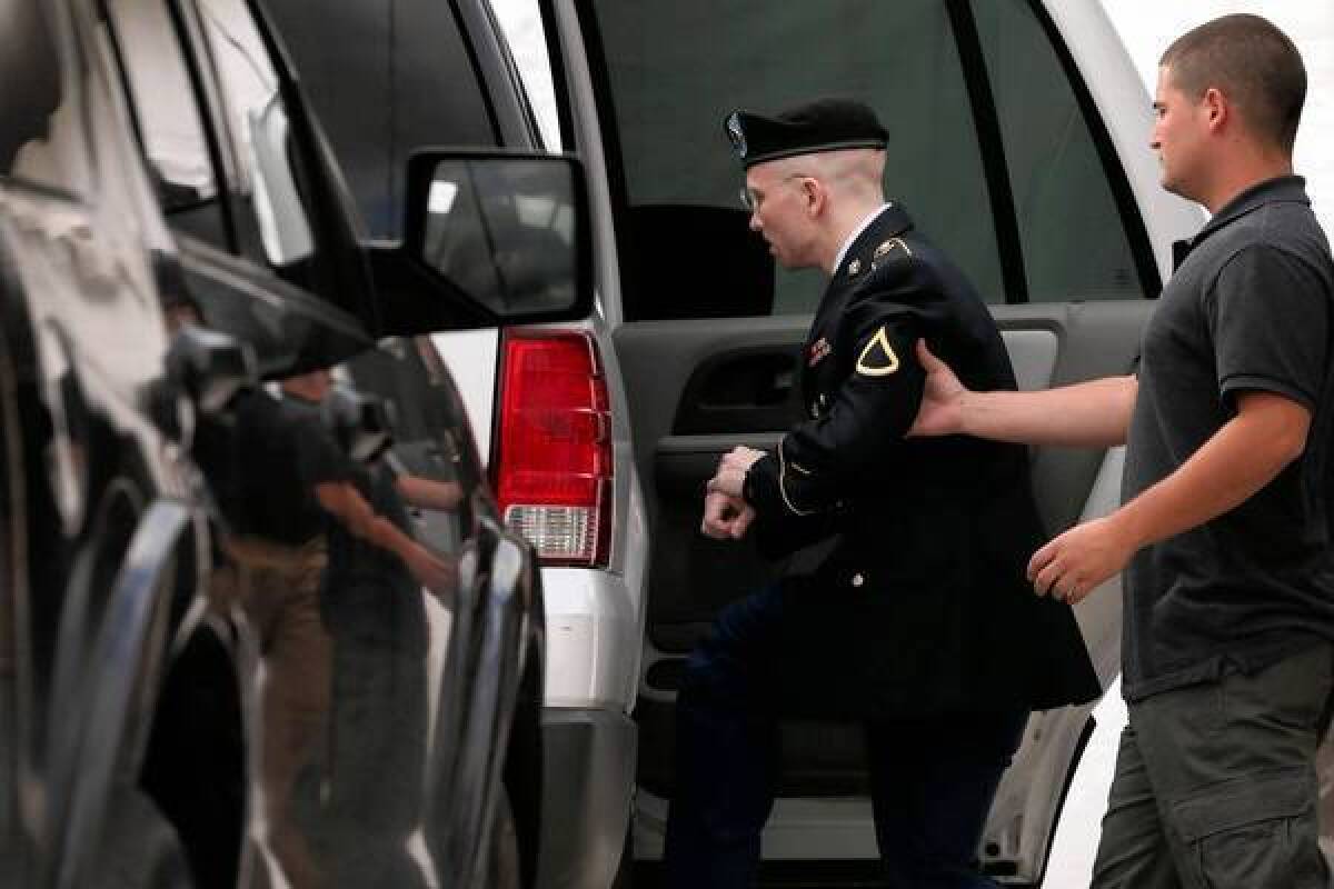 Army Pfc. Bradley Manning leaves court after the start of closing arguments in his court-martial at Ft. Meade, Md.