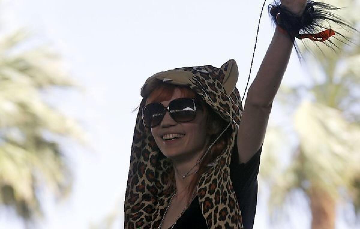 Grimes performs at the Coachella Valley Music & Arts Festival in Indio on April 14, 2013. Catch her this weekend too.