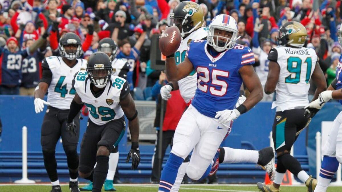 Bills running back LeSean McCoy runs past the Jaguars defense for a touchdown during a game on Nov. 27.
