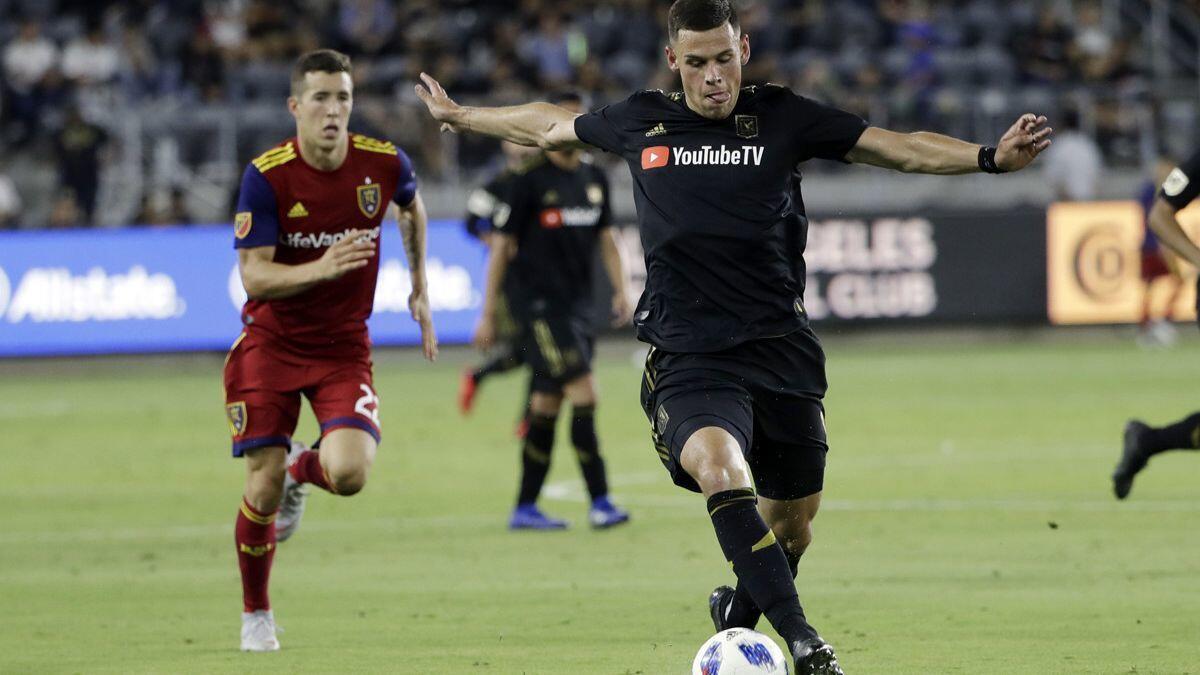 LAFC's Christian Ramirez, right, controls the ball during the second half against Real Salt Lake on Wednesday.