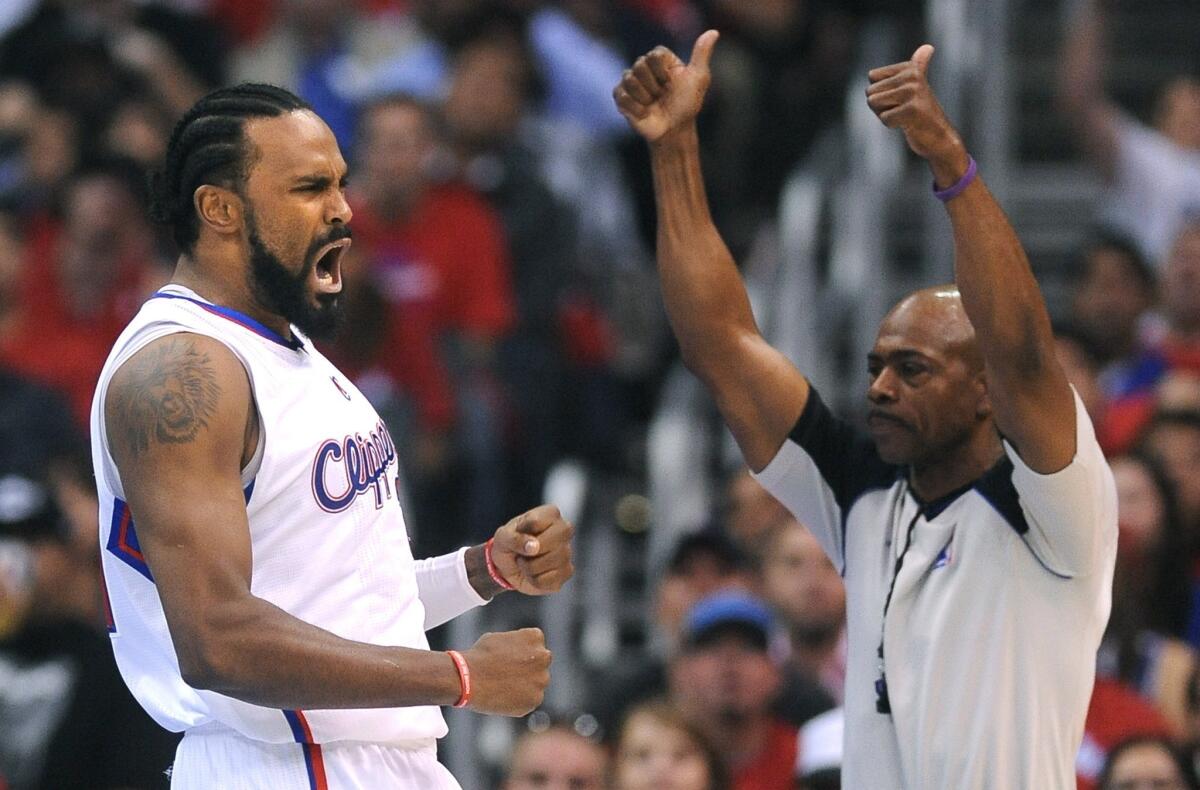 Clippers big man Ronny Turiaf celebrates after forcing a jump ball.