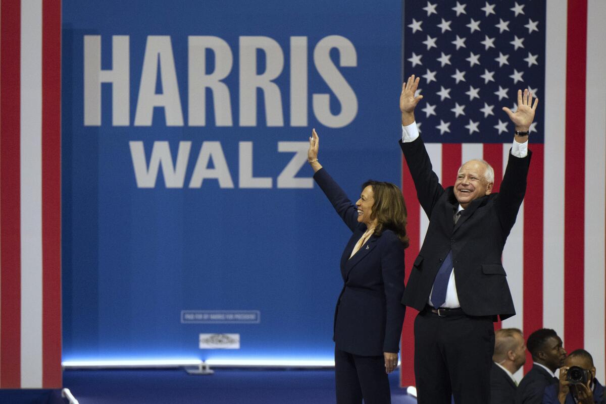 Kamala Harris and Tim Walz at their first rally together Tuesday in Philadelphia.